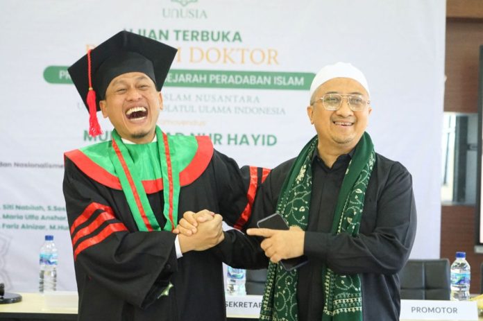 Foto : Komisioner BNSP Muhammad Nur Hayid seusai dinyatakan layak mendapat gelar Doktor (DR), Rabu 14 Agustus 2024, di Jakarta (Doc.Ist)